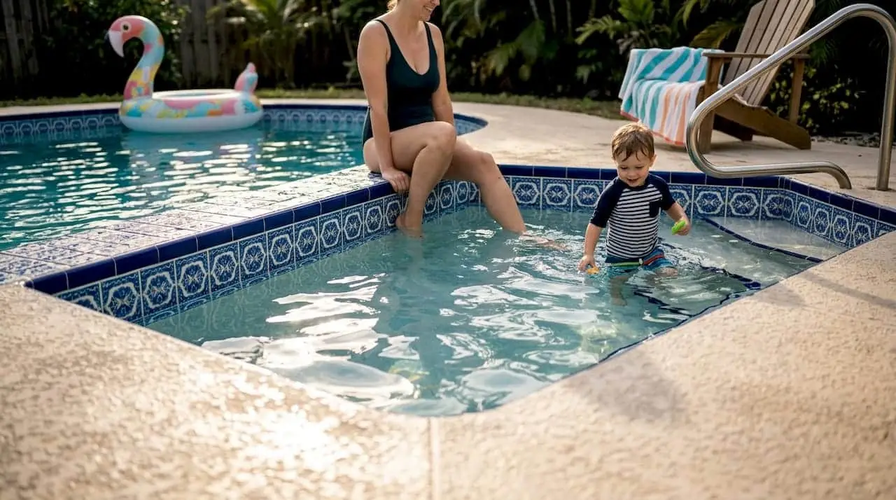 Family enjoys Florida pool with detailed tile