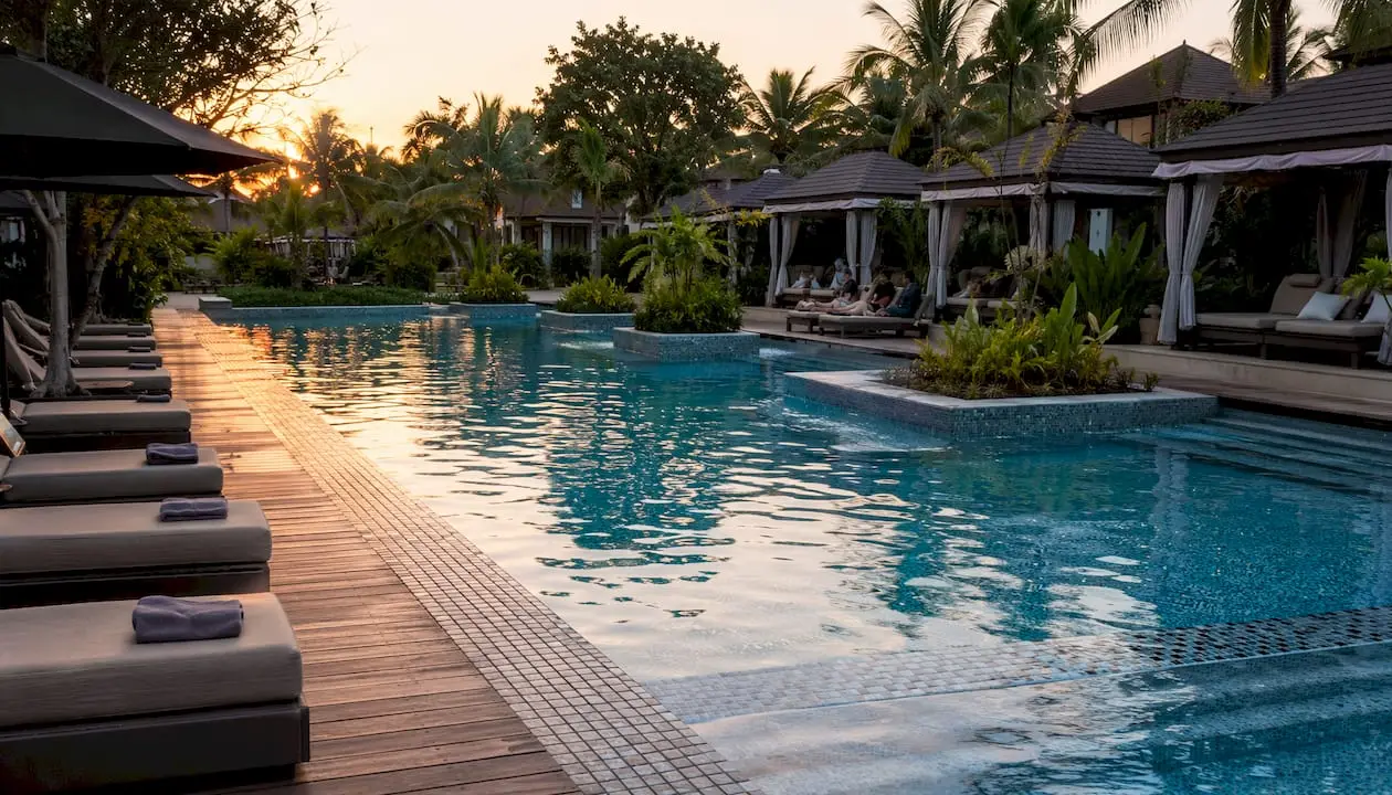 Luxury resort pool with pebble finish and mosaics