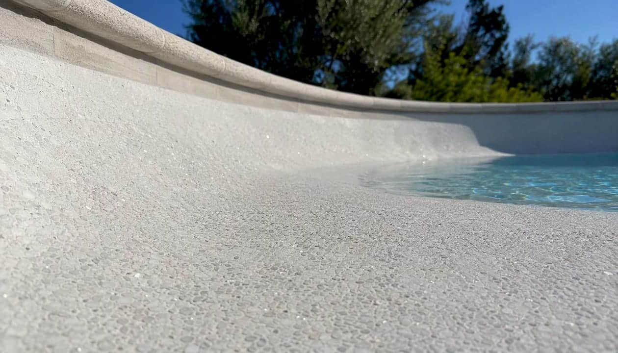 Close-up of white marcite pool surface texture