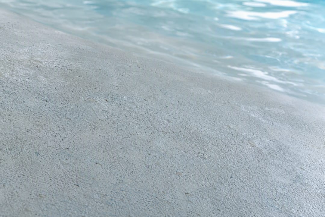 Close-up of marcite plaster pool surface texture